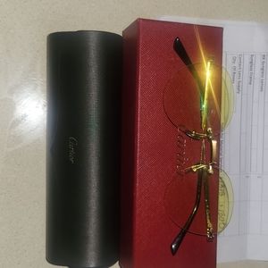 Cartiar glasses!! With yellow frame!!